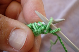 Slipped knit stitch back on left needle